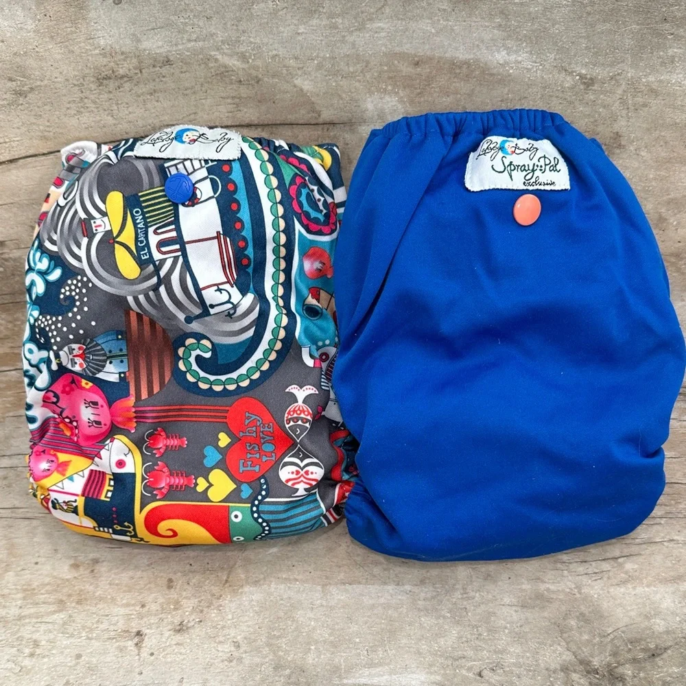 Lalabye Baby, one size cloth diapers reusable. Pair, one print one solid. *USED*
